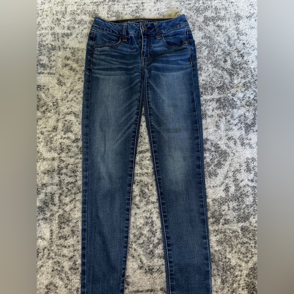 American Eagle Outfitters Super Stretch Jegging Medium Wash Size: 0 Short - Picture 2 of 5